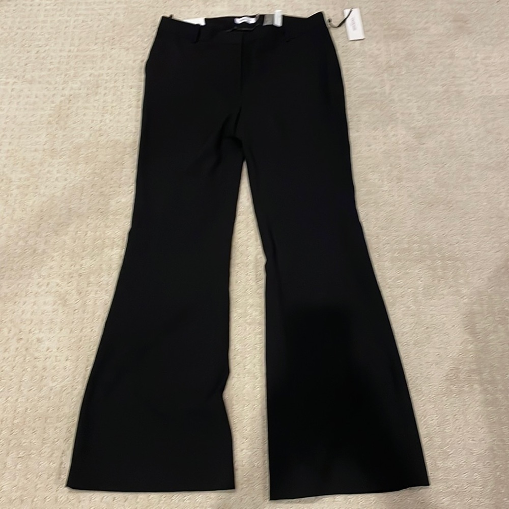 Calvin Klein black flared trousers.